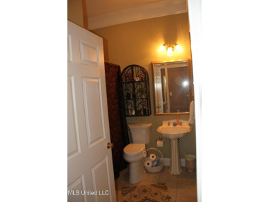 A beautiful 1 owner home built in 1995 located on the fairway of on Colonial Country Club Deerfield in Mississippi - for sale on GolfHomes.com, golf home, golf lot