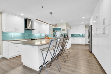 Situated on a nearly half-acre, fully fenced lot in a quiet on Pine Tree Golf Club in Florida - for sale on GolfHomes.com, golf home, golf lot