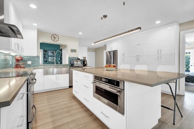 Situated on a nearly half-acre, fully fenced lot in a quiet on Pine Tree Golf Club in Florida - for sale on GolfHomes.com, golf home, golf lot