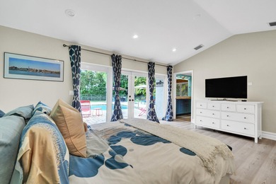 Situated on a nearly half-acre, fully fenced lot in a quiet on Pine Tree Golf Club in Florida - for sale on GolfHomes.com, golf home, golf lot