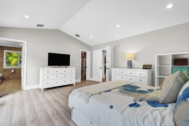 Situated on a nearly half-acre, fully fenced lot in a quiet on Pine Tree Golf Club in Florida - for sale on GolfHomes.com, golf home, golf lot