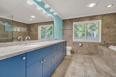 Situated on a nearly half-acre, fully fenced lot in a quiet on Pine Tree Golf Club in Florida - for sale on GolfHomes.com, golf home, golf lot