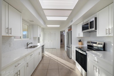 Stunning TURNKEY updated WATERFRONT home in Leisure World! Enjoy on Leisure World Country Club in Arizona - for sale on GolfHomes.com, golf home, golf lot