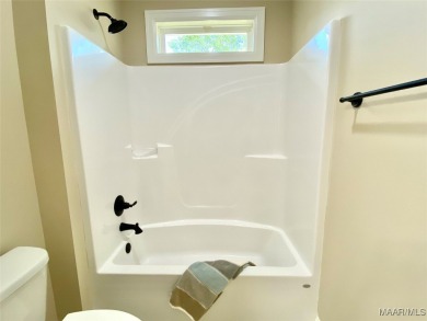 Gorgeous NEW HOME with FOUR bedrooms in desirable Magnolia Ridge on The Pines Golf Club in Alabama - for sale on GolfHomes.com, golf home, golf lot