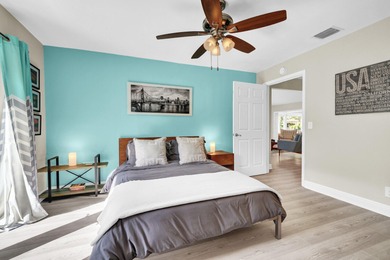 Situated on a nearly half-acre, fully fenced lot in a quiet on Pine Tree Golf Club in Florida - for sale on GolfHomes.com, golf home, golf lot