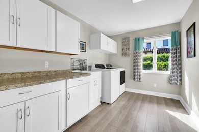 Situated on a nearly half-acre, fully fenced lot in a quiet on Pine Tree Golf Club in Florida - for sale on GolfHomes.com, golf home, golf lot