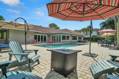 Situated on a nearly half-acre, fully fenced lot in a quiet on Pine Tree Golf Club in Florida - for sale on GolfHomes.com, golf home, golf lot