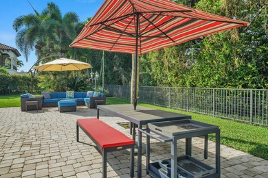 Situated on a nearly half-acre, fully fenced lot in a quiet on Pine Tree Golf Club in Florida - for sale on GolfHomes.com, golf home, golf lot