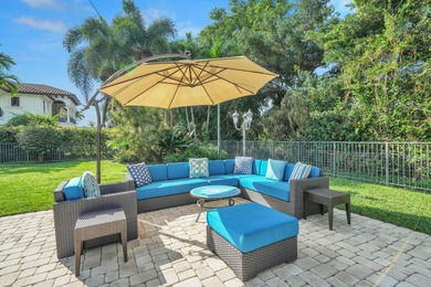 Situated on a nearly half-acre, fully fenced lot in a quiet on Pine Tree Golf Club in Florida - for sale on GolfHomes.com, golf home, golf lot