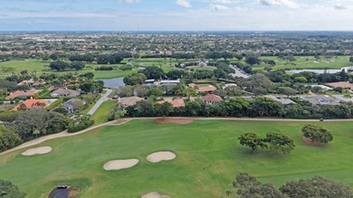 Situated on a nearly half-acre, fully fenced lot in a quiet on Pine Tree Golf Club in Florida - for sale on GolfHomes.com, golf home, golf lot