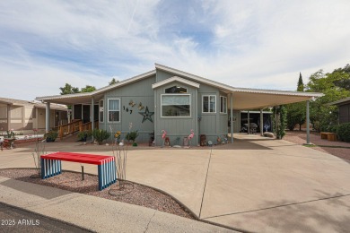 This beautifully updated home sits on an oversized lot and has on Paradise Peak Golf Course in Arizona - for sale on GolfHomes.com, golf home, golf lot
