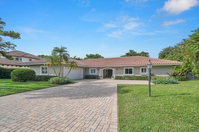 Situated on a nearly half-acre, fully fenced lot in a quiet on Pine Tree Golf Club in Florida - for sale on GolfHomes.com, golf home, golf lot