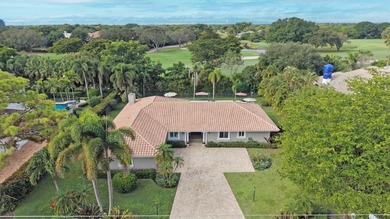 Situated on a nearly half-acre, fully fenced lot in a quiet on Pine Tree Golf Club in Florida - for sale on GolfHomes.com, golf home, golf lot