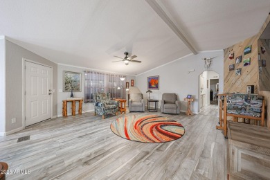 This beautifully updated home sits on an oversized lot and has on Paradise Peak Golf Course in Arizona - for sale on GolfHomes.com, golf home, golf lot