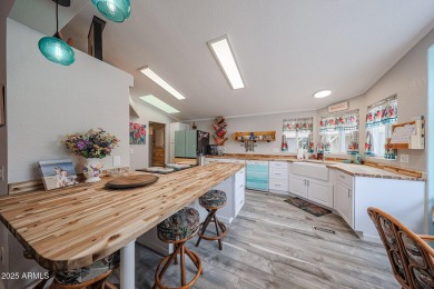 This beautifully updated home sits on an oversized lot and has on Paradise Peak Golf Course in Arizona - for sale on GolfHomes.com, golf home, golf lot