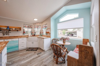 This beautifully updated home sits on an oversized lot and has on Paradise Peak Golf Course in Arizona - for sale on GolfHomes.com, golf home, golf lot