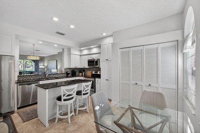 WELCOME TO THIS BEAUTIFULLY MAINTAINED CONDO OFFERING COMFORT on PGA National Golf Club in Florida - for sale on GolfHomes.com, golf home, golf lot