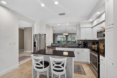 WELCOME TO THIS BEAUTIFULLY MAINTAINED CONDO OFFERING COMFORT on  in Florida - for sale on GolfHomes.com, golf home, golf lot