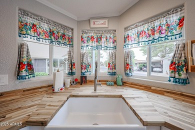 This beautifully updated home sits on an oversized lot and has on Paradise Peak Golf Course in Arizona - for sale on GolfHomes.com, golf home, golf lot
