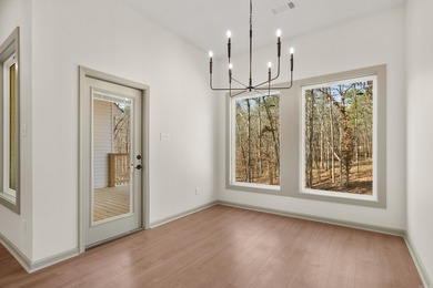 This 3 bedroom/ 2 bathroom new construction home in Diamondhead on Diamondhead Golf and Country Club in Arkansas - for sale on GolfHomes.com, golf home, golf lot