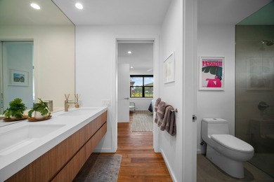 Modern Hawaiian Plantation style residence completed in 2022 and on Kiahuna Golf Club in Hawaii - for sale on GolfHomes.com, golf home, golf lot