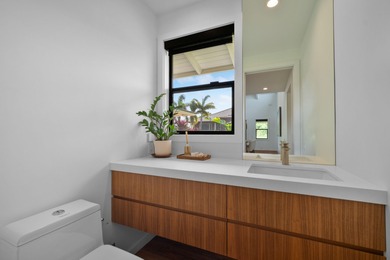 Modern Hawaiian Plantation style residence completed in 2022 and on Kiahuna Golf Club in Hawaii - for sale on GolfHomes.com, golf home, golf lot