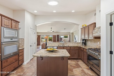 This beautifully situated Laredo model in Quail Creek is on Quail Creek Country Club  in Arizona - for sale on GolfHomes.com, golf home, golf lot