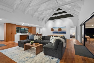 Modern Hawaiian Plantation style residence completed in 2022 and on Kiahuna Golf Club in Hawaii - for sale on GolfHomes.com, golf home, golf lot