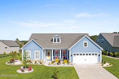 Experience refined coastal living in this beautifully appointed on Crow Creek Golf Club in North Carolina - for sale on GolfHomes.com, golf home, golf lot