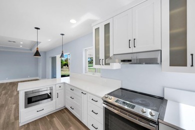 Welcome to classic Marco Island charm reimagined for coastal on Island Country Club in Florida - for sale on GolfHomes.com, golf home, golf lot