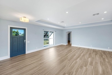 Welcome to classic Marco Island charm reimagined for coastal on Island Country Club in Florida - for sale on GolfHomes.com, golf home, golf lot