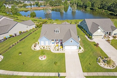 Experience refined coastal living in this beautifully appointed on Crow Creek Golf Club in North Carolina - for sale on GolfHomes.com, golf home, golf lot