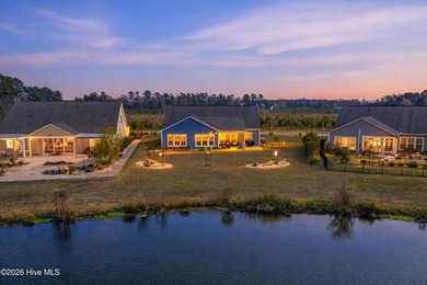 Experience refined coastal living in this beautifully appointed on Crow Creek Golf Club in North Carolina - for sale on GolfHomes.com, golf home, golf lot