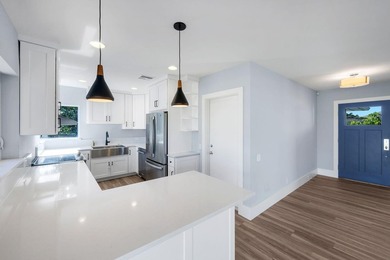 Welcome to classic Marco Island charm reimagined for coastal on Island Country Club in Florida - for sale on GolfHomes.com, golf home, golf lot