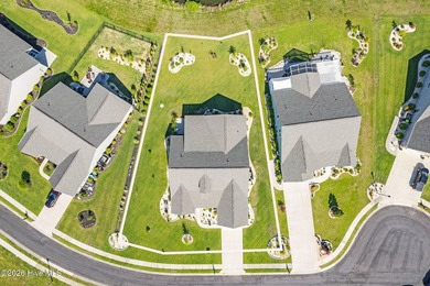 Experience refined coastal living in this beautifully appointed on Crow Creek Golf Club in North Carolina - for sale on GolfHomes.com, golf home, golf lot