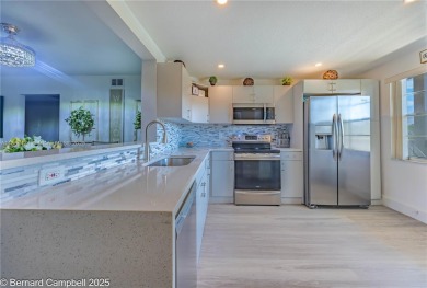 Welcome to this beautifully updated 2-bedroom, 2-bathroom condo on Wynmoor Golf Course in Florida - for sale on GolfHomes.com, golf home, golf lot