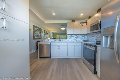 Welcome to this beautifully updated 2-bedroom, 2-bathroom condo on Wynmoor Golf Course in Florida - for sale on GolfHomes.com, golf home, golf lot