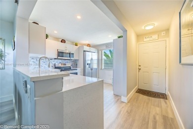Welcome to this beautifully updated 2-bedroom, 2-bathroom condo on Wynmoor Golf Course in Florida - for sale on GolfHomes.com, golf home, golf lot