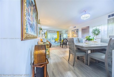 Welcome to this beautifully updated 2-bedroom, 2-bathroom condo on Wynmoor Golf Course in Florida - for sale on GolfHomes.com, golf home, golf lot