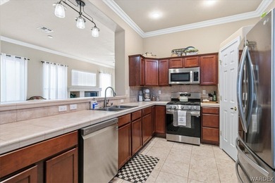 Gorgeous 2-bedroom, 2-bath home with 1,340 sq. ft. in the on Laughlin Ranch Golf Club in Arizona - for sale on GolfHomes.com, golf home, golf lot