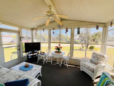 This charming two-bedroom, two-bathroom home is situated on a on Pine Lakes Country Club in Florida - for sale on GolfHomes.com, golf home, golf lot