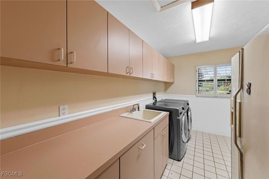 Set within the prestigious Eagle Ridge Community, this on Eagle Ridge Golf and Tennis Club in Florida - for sale on GolfHomes.com, golf home, golf lot