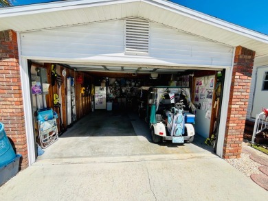 This charming two-bedroom, two-bathroom home is situated on a on Pine Lakes Country Club in Florida - for sale on GolfHomes.com, golf home, golf lot
