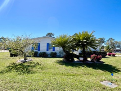 This charming two-bedroom, two-bathroom home is situated on a on Pine Lakes Country Club in Florida - for sale on GolfHomes.com, golf home, golf lot