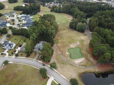 Discover the epitome of luxury living at 1065 Wigeon Dr in the on Wild Wing Plantation in South Carolina - for sale on GolfHomes.com, golf home, golf lot