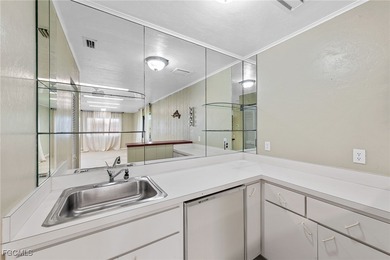 Set within the prestigious Eagle Ridge Community, this on Eagle Ridge Golf and Tennis Club in Florida - for sale on GolfHomes.com, golf home, golf lot