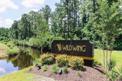 Discover the epitome of luxury living at 1065 Wigeon Dr in the on Wild Wing Plantation in South Carolina - for sale on GolfHomes.com, golf home, golf lot