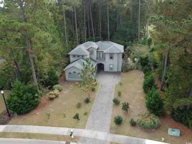 Discover the epitome of luxury living at 1065 Wigeon Dr in the on Wild Wing Plantation in South Carolina - for sale on GolfHomes.com, golf home, golf lot