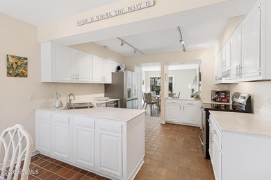 Spacious 4-bedroom, 3-bath home situated on a corner lot in on Brandywine Bay Golf Club in North Carolina - for sale on GolfHomes.com, golf home, golf lot