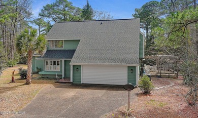 Spacious 4-bedroom, 3-bath home situated on a corner lot in on Brandywine Bay Golf Club in North Carolina - for sale on GolfHomes.com, golf home, golf lot